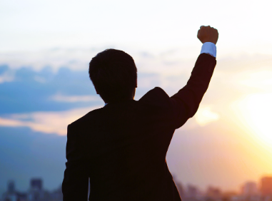 こぶしを突き上げ画像